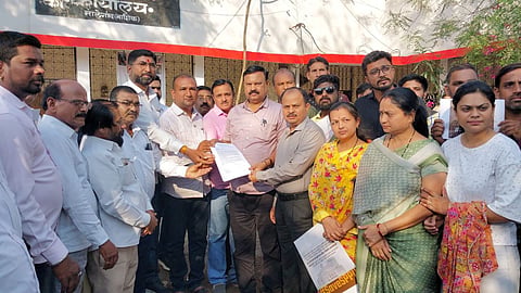 protest demand resignation pune university vc suresh gosavi nashik
