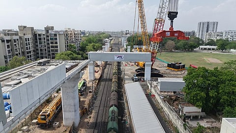 mumbai ahmedabad bullet train heaviest portal beam launched over railway track maninagar