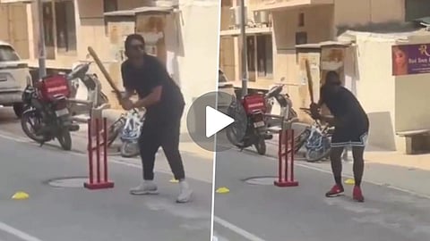 Tim David and Romario Shepherd enjoying gully cricket