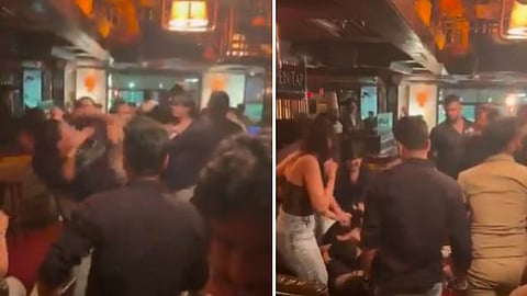 A viral video shows two drunk men fighting inside a Gurugram club.