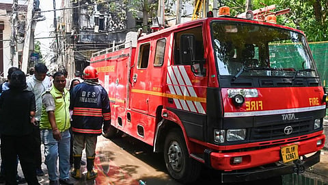 Massive fire in Delhi's New Friends Colony; 8 people rescued safely.