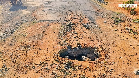 Large potholes on the main bridge along the Shirsufal-Bhigwan route in Baramati have created a severe accident risk, sparking intense anger among local villagers.