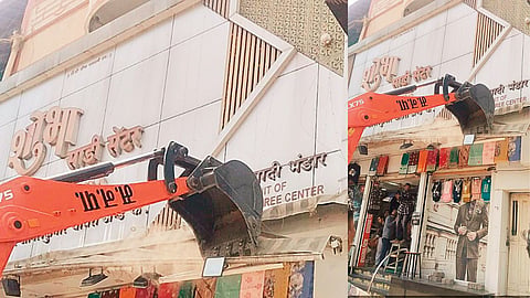 Crackdown on footpath encroachers in Nagpur; NMC's bulldozer action in Mahal; sheds of 14 shops removed.