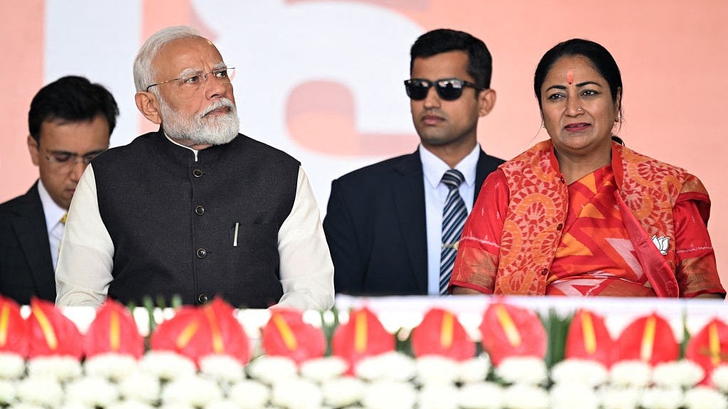 शपथ ग्रहण के मौके पर दिल्ली की मुख्यमंत्री रेखा गुप्ता और प्रधानमंत्री नरेंद्र मोदी (फोटो : Getty Images)