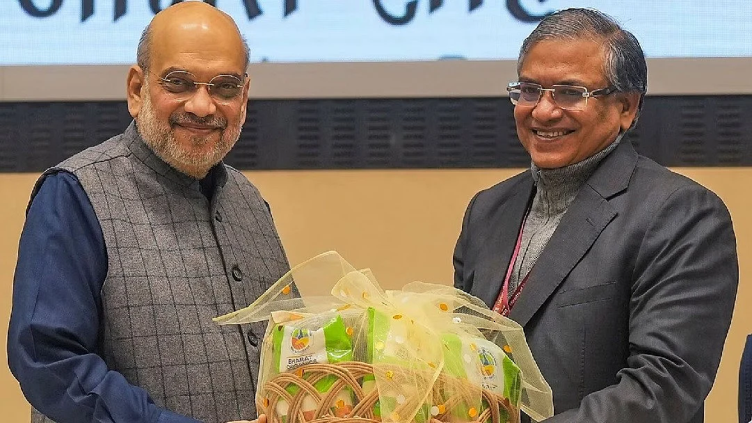 केंद्रीय गृहमंत्री अमित शाह और मुख्य चुनाव आयुक्त ज्ञानेश कुमार (फोटो - पीटीआई)