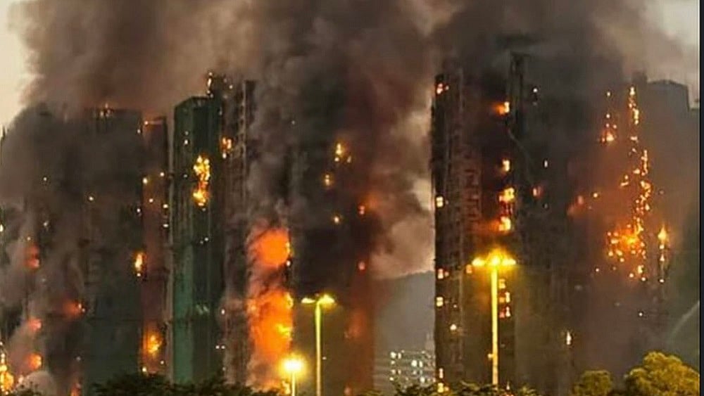 हांगकांग में बहुमंजिला इमारतों में लगी आग में मृतकों की संख्या 128 हुई।