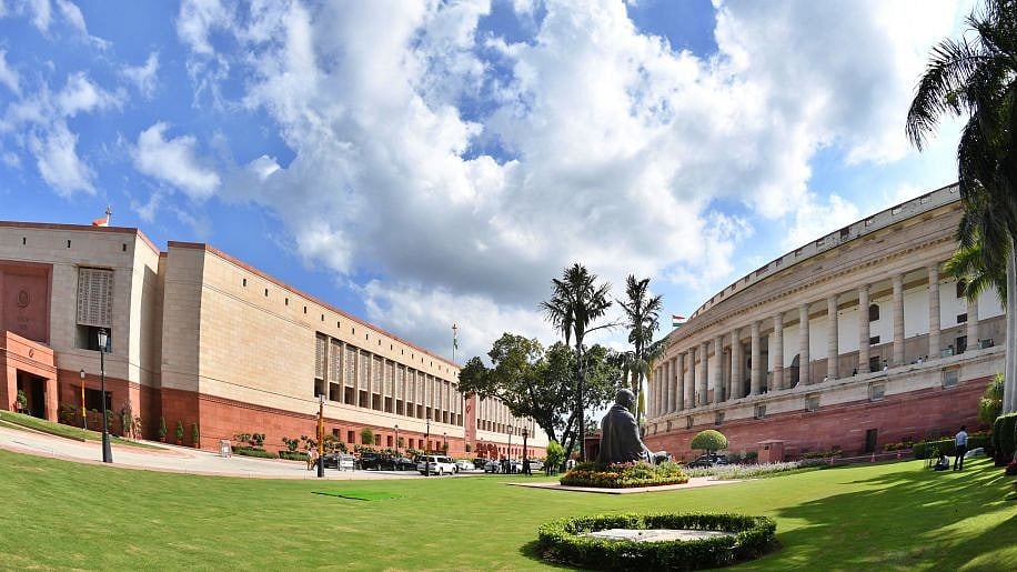 संसद की नई और पुरानी इमारतें (फोटो - Getty Images)