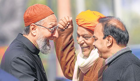 Asaduddin Owaisi (L) seen with BJP MPs Virendra Singh Mast and Ranjith Reddy at Parliament House in New Delhi in this file photo.
