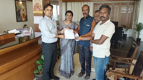 Chandramohan, alongside other members of the organization, submitting a memorandum to DC Venkat Raja demanding an action plan to preserve Cauvery.