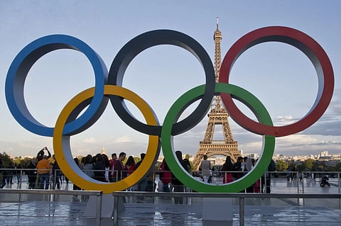 The Olympic rings are set up at Trocadero Plaza which overlooks the Eiffel Tower.