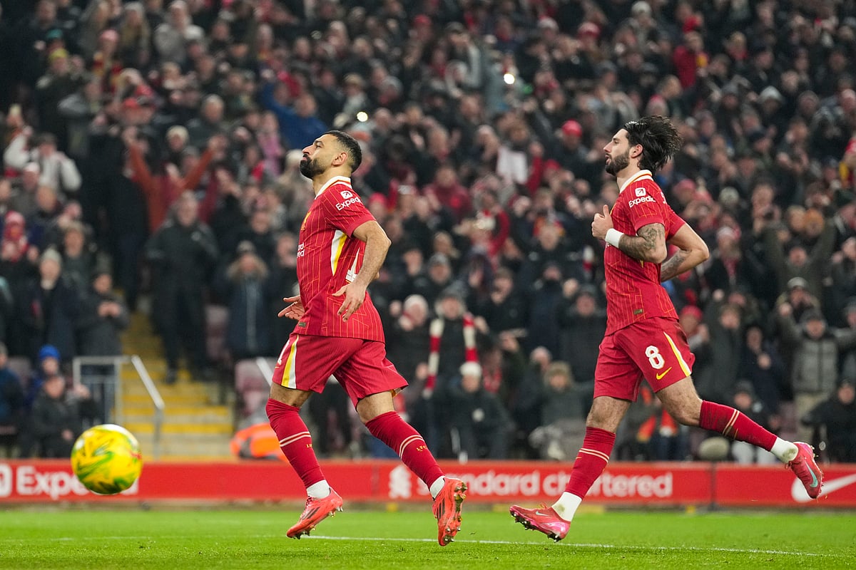 Liverpool routs Tottenham 40 to set up English League Cup final