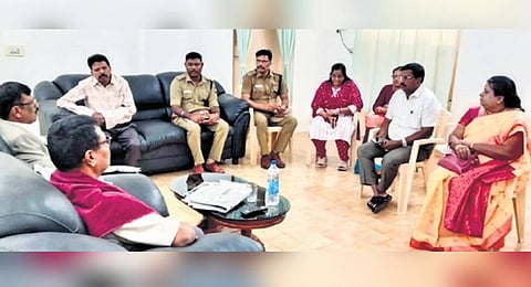 National Commission for Scheduled Castes director S Ravivarman inquiring with the victim in Kovilpatti on Tuesday