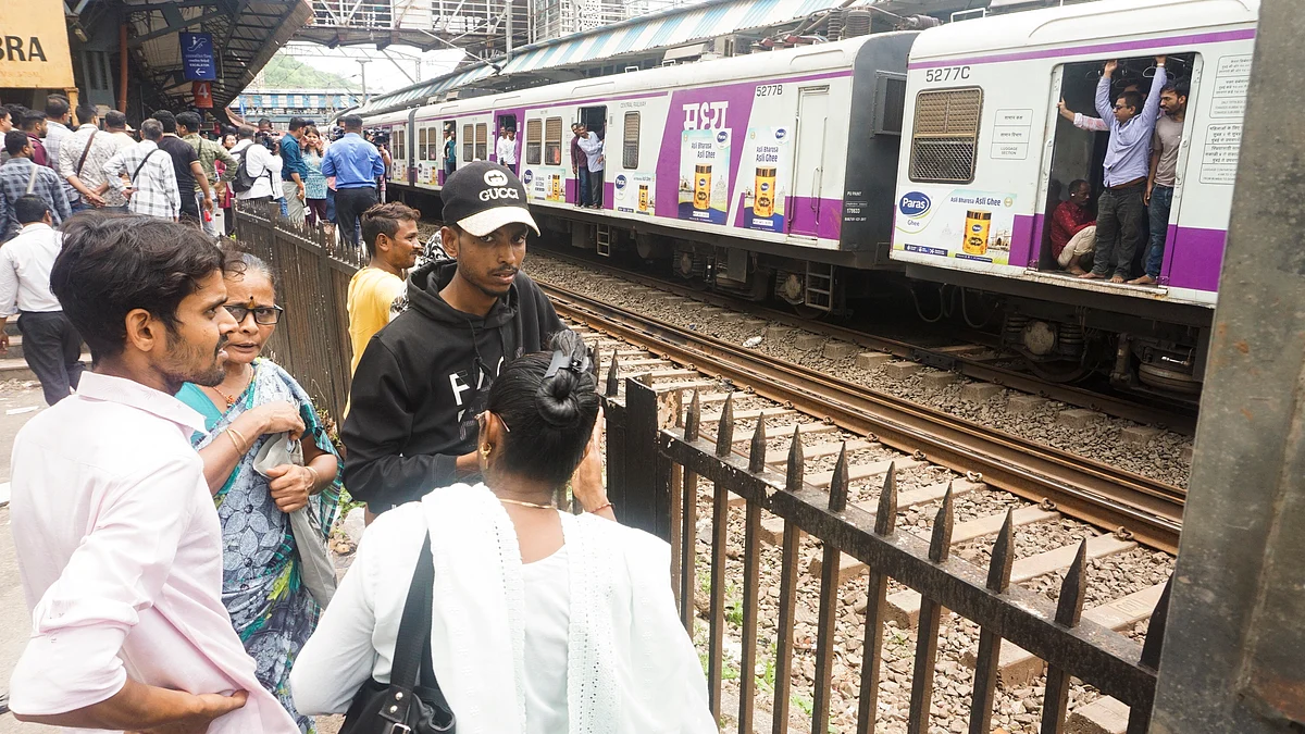 Panic stricken people at Mumbra Railway Station after several passengers reportedly fell from a moving train, resulting in four deaths and multiple injuries, in Thane, Monday, June 9, 2025.