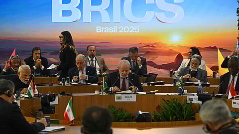 Brazil's President Luiz Inacio Lula da Silva (C) speaks during the first plenary session of the BRICS summit in Rio de Janeiro, Brazil, on July 6, 2025