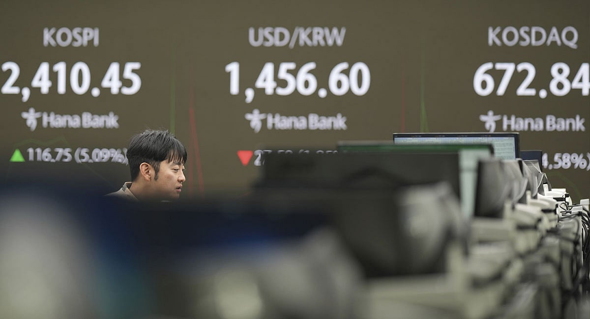Asia shares jump after US stocks soared to historic gains