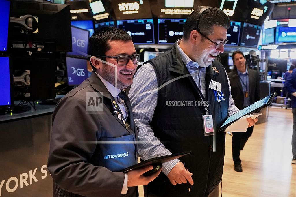 Wall Street rallies and recovers all of Monday’s slide as the dollar and US bond market steady