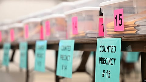 Counted ballots for various precincts are displayed at the Flathead County Fairgrounds in Kalispell, Montana, Nov. 9, 2022.