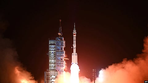 A Long March-2F carrier rocket, carrying the Shenzhou-15 spacecraft with three astronauts to China's Tiangong space station, lifts off from the Jiuquan Satellite Launch Center in Northwest China's Gansu Province late on Nov. 29, 2022. (AFP)
