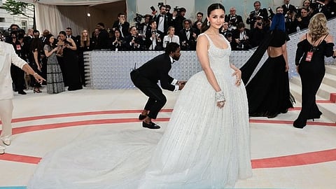 efore the designer said, "From Mumbai to Met," Alia joked, "Cool, can somebody like lift me up now, and place me on the carpet from here?" [IANS]