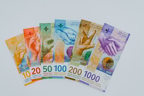 the Swiss franc holding a reputation as one of the world’s most stable currencies. (Unsplash)
