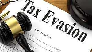 Indian-origin tax evader:- A 56-year-old Indian-origin tax return preparer in the US state of Georgia has been sentenced to two years in prison after he pled guilty to tax evasion.[IANS]