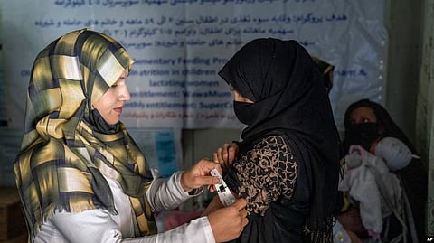 Afghan women: Sana Safi, a young a doctor in Afghanistan, takes pride in her work, for she is among a shrinking group of female health experts [VOA]