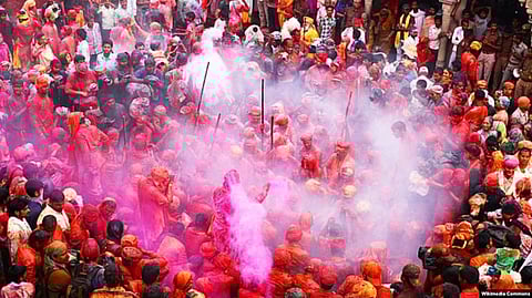 Hindu Holi festival: Hindus across India and other South Asian countries, dressed mostly in white, smeared or sprayed friends and relatives with brightly colored powder [VOA]
