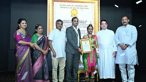 Remona Pereira receiving the world record for her dance marathon spanning 7 days