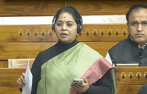 In the image sudha is shown addressing the parliament 
