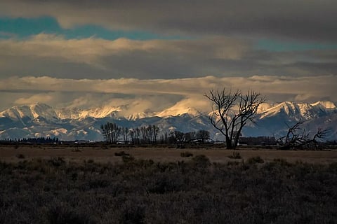 The Sangre de Cristo Mountains loom over Colorado's San Luis Valley