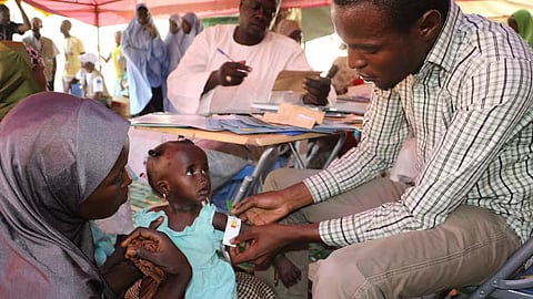 child is shown vaccinated