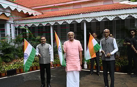 C.P. Radhakrishnan hoisting the tiranga indian tricolour flag