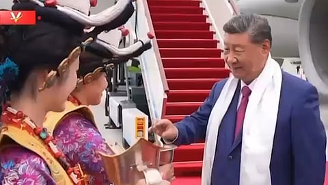 In this image made from Chinese government video, Chinese President Xi Jinping is greeted upon his arrival in Lhasa, Tibet Autonomous Region, Aug. 20, 2025. 