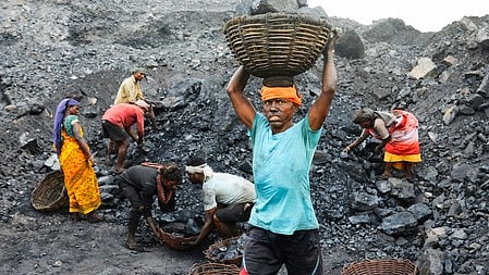 Dhanbad: Coal workers at work on the eve of Labour Day, in Dhanbad, Wednesday, April 30, 2025. 