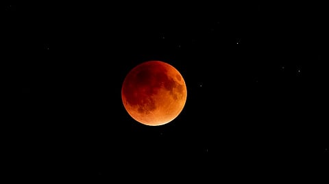 Image of the rare blood moon moon at the time of lunar eclipse when the moon turned into deep red hue.