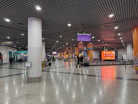 Passengers in the newly built Techo International Airport in Kandal province, on the outskirts of Phnom Penh, Sept. 9, 2025.