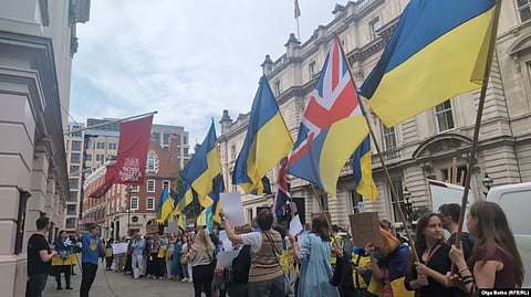 Protesters demonstrate outside the Royal Opera House in London on September 7.
