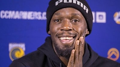 CENTRAL COAST, Aug. 21, 2018 (Xinhua) -- Jamaica's Usain Bolt attends a press conference with the Central Coast Mariners soccer team in Central Coast, Australia, Aug. 21, 2018. Usain Bolt attended the first day of training with Australia football club, the Central Coast Mariners. 