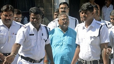 Kolkata: Former TMC minister Partha Chatterjee coming out after being produced at court by ED officials in Kolkata on Oct 31, 2022. 