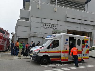 HONG KONG, Jan. 8, 2019 (Xinhua) -- Rescuers and media workers are seen outside the Marine Police Aberdeen Base in Hong Kong, south China, Jan. 8, 2019.