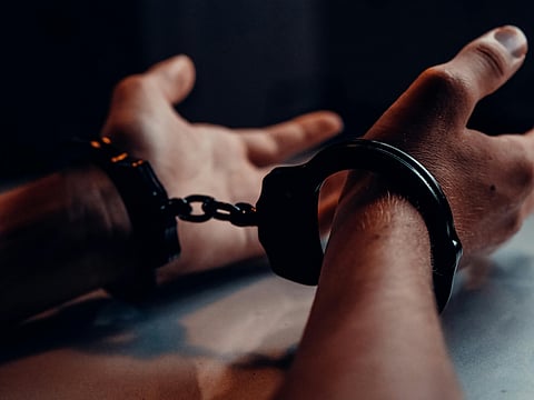 Image of man in handcuffs 