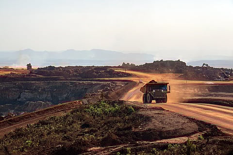 Coal mine from outside and dumper carrying mined coal