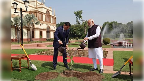 PM Narendra Modi and the President of Mongolia, Khurelsukh Ukhnaa planting a sapling at the premises of Hyderabad House, in New Delhi on October 14, 2025 
