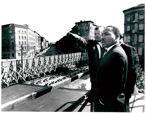 image of Martin Luther King Jr. at the Berlin Wall, September 1964.
