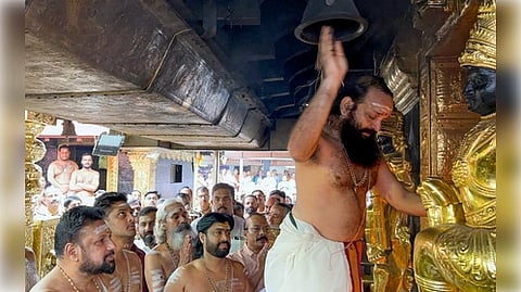 Sabarimala Priest doing puja