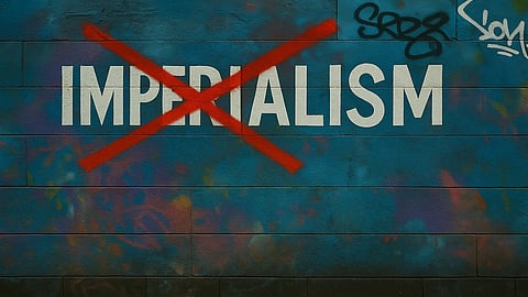 There is a wall with colourful graffiti and above that is written imperialism and then a cross above it