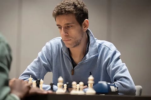 Naroditsky playing a game of chess