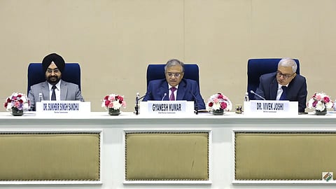 A press conference by the ECI on 27 October 2025, with CEC Gyanesh Kumar sitting in the centre, while Commissioners Sandhu and Joshi sit beside him.