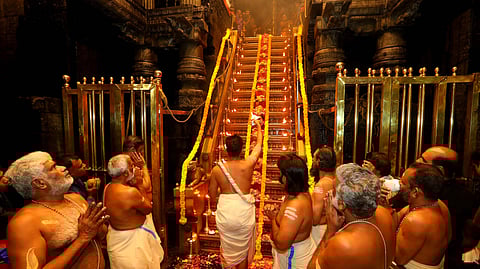 Sabarimala: Priests perform the Padipuja under the guidance of Tantri Brahmasree Kantarar Brahmadatta at Sabarimala temple in Kerala on Tuesday, June 17, 2025. 