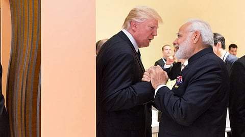 Indian Prime Minister Narendra Modi and US President Donald Trump sharing a warm moments by holding hands. 